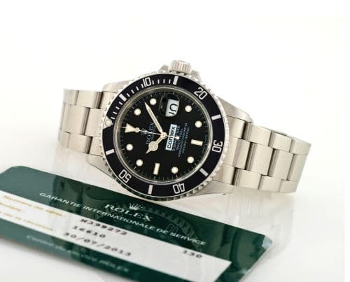 Submariner Date 16610 Comex — photo from WatchBase · Photo: WatchBase · © WatchBase, used with permission · Source: https://watchbase.com/rolex/submariner/16610-comex