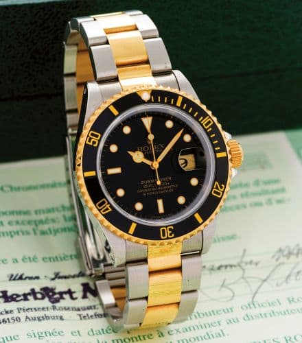 Submariner Date 16613 Black Tritium — photo from WatchBase · Photo: WatchBase · © WatchBase, used with permission · Source: https://watchbase.com/rolex/submariner/16613-black-tritium