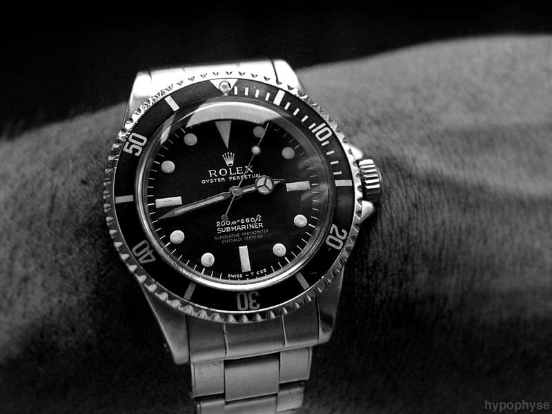 The same 5512 from the front: matte four-line dial with “200m=660ft” above “Submariner”, chronometer lines and T<25 marking and a black bezel insert. · Photo: hypo.physe (Flickr) · CC BY-SA 2.0 · https://creativecommons.org/licenses/by-sa/2.0/ · Source: https://www.flickr.com/photos/hypophyse/4435845295/