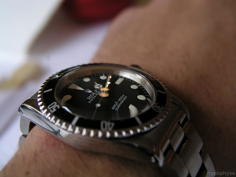 Side view of the same 5513 showing the case, crown guards and the matte two-line feet-first dial. · Photo: hypo.physe (Flickr) · CC BY-SA 2.0 · https://creativecommons.org/licenses/by-sa/2.0/ · Source: https://www.flickr.com/photos/hypophyse/4280478376/