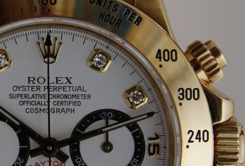 Detail of the same Daytona ref. 16528 (S serial): chronograph pushers, screw-down crown and sub-dials; crop of "Daytona 16528.jpg". · Photo: Alesili · CC BY-SA 3.0 · https://creativecommons.org/licenses/by-sa/3.0 · Source: https://commons.wikimedia.org/wiki/File:Detail_of_Rolex_Daytona.jpg